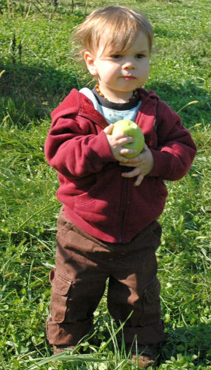 Okay Mommy you can take my picture if you want, I have an apple!