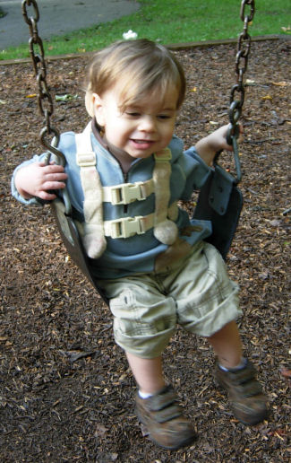 I love to swing on the big kids swings