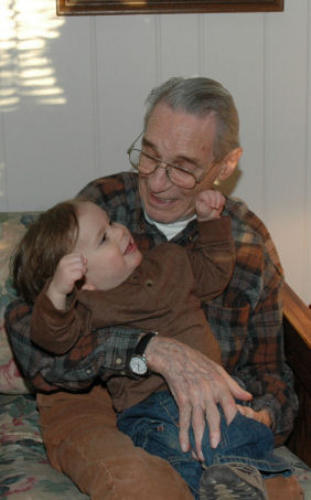 Desmond looking up at Poppop in December